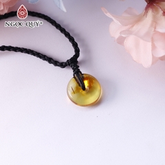 Mặt dây chuyền đồng điếu đá hổ phách vàng