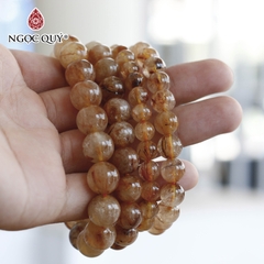 Vòng tay đá thạch anh tóc vàng cam A hạt trơn