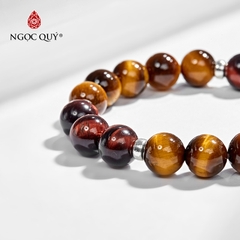 Vòng tay phong thủy đá mắt hổ vàng nâu phối charm tròn bạc