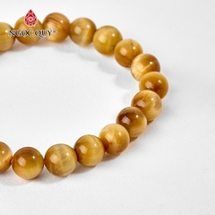 Vòng tay phong thủy đá mắt hổ vàng tâm phối charm lục tự bạc mạ vàng hạt 8mm