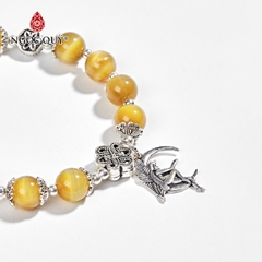 Vòng tay phong thủy đá mắt hổ vàng tâm phối charm kết đồng tâm bạc hạt 8mm