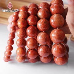 Vòng tay đá san hô hóa thạch đỏ hạt trơn