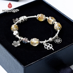 Vòng thạch anh tóc vàng phối charm bạc