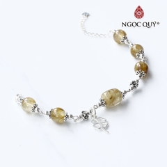 Vòng tay lu thống đá thạch anh tóc phối charm bạc cỏ 4 lá