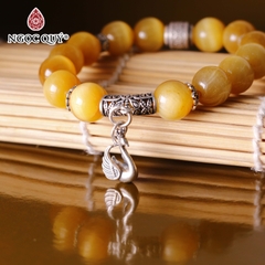 Vòng tay đá mắt hổ vàng tâm mix charm bạc thiên nga