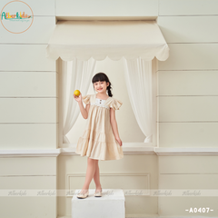 Váy bé gái màu be tay cánh tiên phối ren A0407
