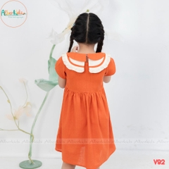 Váy bé gái cổ tròn 2 màu sắc cam - vàng V92
