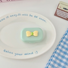 Khay gương gắn nơ kèm dụng cụ đeo