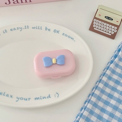 Khay gương gắn nơ kèm dụng cụ đeo