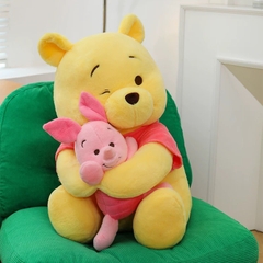 Gấu Pooh ôm heo Piglet
