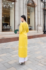 SONO - Áo dài vàng tươi thêu cành hoa
