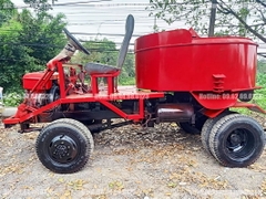 Máy trộn bê tông tự hành 12 bao 2 cầu Phanh hơi lốc kê