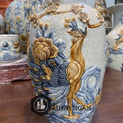 lộc bình công đào men rạn đắp nổi