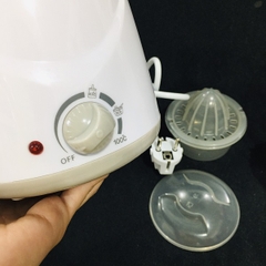 Máy hâm sữa và Tiệt trùng bình sữa 4 chức năng Mum's Care MC7002