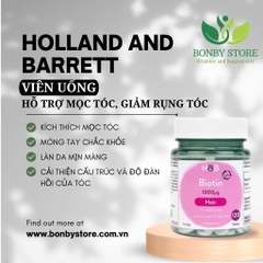 g quá trình chuyển hóa các chất dinh d Một hộp viên uống hỗ trợ mọc tóc H & B Biotin 1000µg màu xanh có nhãn Biotin