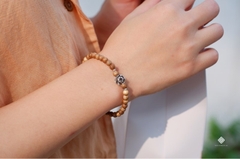 Vòng tay trầm rừng phối hoa sen bạc