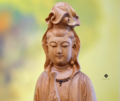 Tượng Quan Âm dòng suối cam lồ lũa nhai bách