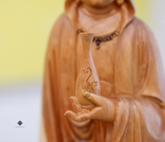 Tượng Quan Âm dòng suối cam lồ lũa nhai bách