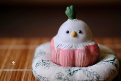 Tượng gốm bé chim củ tỏi