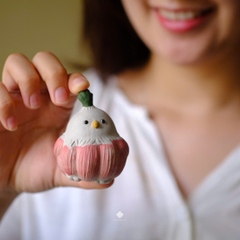 Tượng gốm bé chim củ tỏi