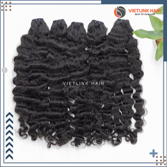 BURMESE LOOSE CURLY BUNDLE - NATURAL COLOR