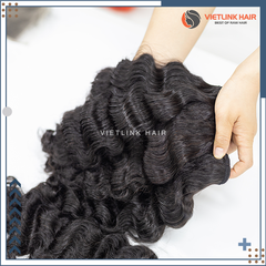 BURMESE LOOSE CURLY BUNDLE - NATURAL COLOR