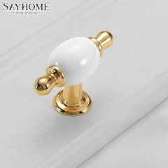 Núm tủ tân cổ điển vintage màu vàng gold gốm sứ SH6833