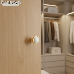 Núm tủ hiện đại màu vàng gold mặt sứ trắng SH9021