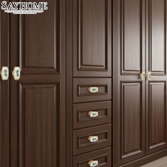 Núm tủ tân cổ điển vintage gốm sứ hoa văn hai màu vàng gold và đồng đen SH9024