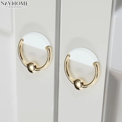 Tay nắm tủ khoen tròn hiện đại màu vàng gold trắng SH1010