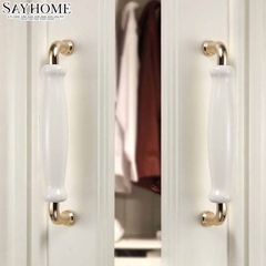 Tay nắm tủ hiện đại màu vàng gold mặt sứ trắng SH5537