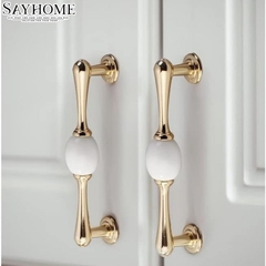 Tay nắm tủ tân cổ điển Vintage màu vàng gold mặt sứ trắng SH6833