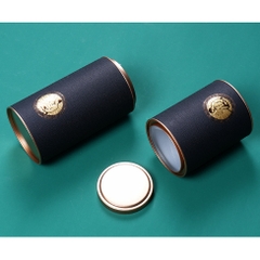 SET QUÀ TANG Lon thiếc giấy tròn đựng trà sáng tạo in hình ông già nhiều màu sắc-Phukientuiloc