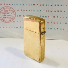 Bật lửa Zippo Slim Mỹ Brass trơn sản xuất 2006, hàng chính hãng có giấy nhập khẩu gửi kèm theo đơn hàng