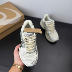 asic kayano xám kem