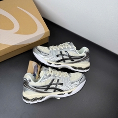 asic kayano đen kem