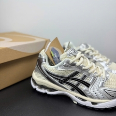 asic kayano đen kem