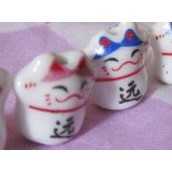 50 cái mặt mèo may mắn (120gam)