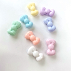 50-500gam Nơ 16x27mm dễ thương ,hạt charm holo  bóng đẹp có lỗ xỏ dọc