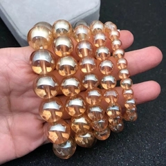 vòng tay đá màu vàng trà bóng đủ size