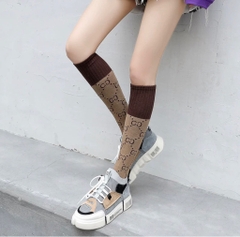 Tất chân cổ cao Gucci 937