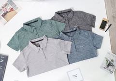 ເສື້ອມີຄໍຍິງມີກະດຸມ NIKE