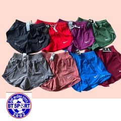 ໂສ້ງຂາສັ້ນ2ຂັ້ນຍີງ NIKE