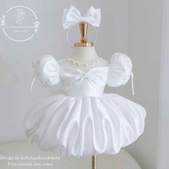 white-satin-baby-girl-princess-dress-with-puff-sleeves-pearl-neckline-and-bow-bo