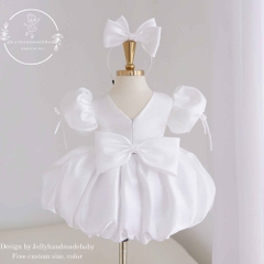 white-satin-baby-girl-princess-dress-with-puff-sleeves-pearl-neckline-and-bow-bo