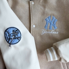 2025 - Áo Bomber New Era Nỉ Varsity NY New York Yankee Be - Chữ Xanh [HÀNG CHÍNH HÃNG]