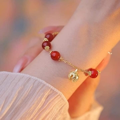 Lắc tay phong thủy hạt ngọc đỏ mix chuông
