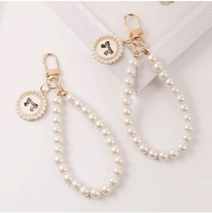 Dây móc điện thoại ngọc trai đính nơ