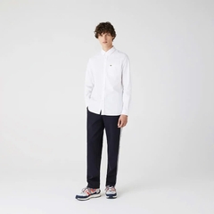 Sơ mi Lacoste trắng túi ngực
