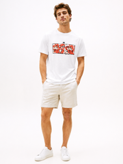 Thun Tommy Hifilger trắng họa tiết hoa nền đỏ
